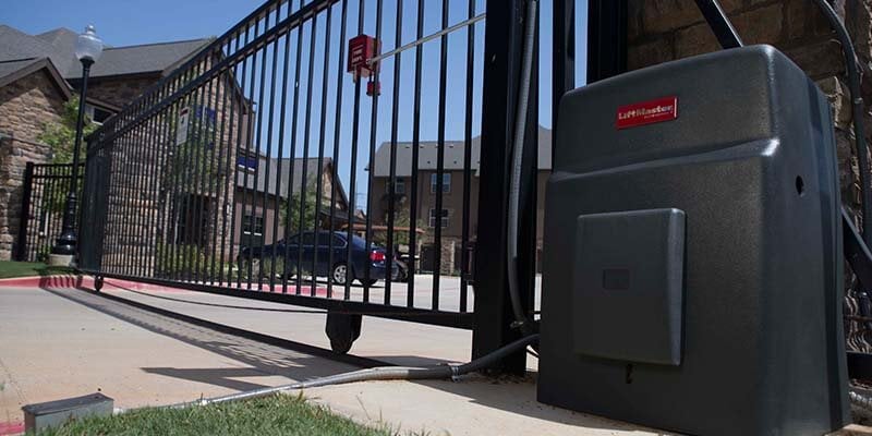 Residential electric gate with an automatic opener system
