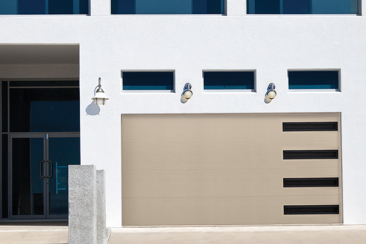 Modern house exterior with garage door and windows